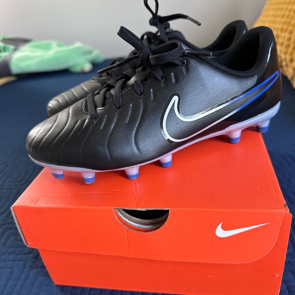 Nike Black Cleats with Blue and White Details